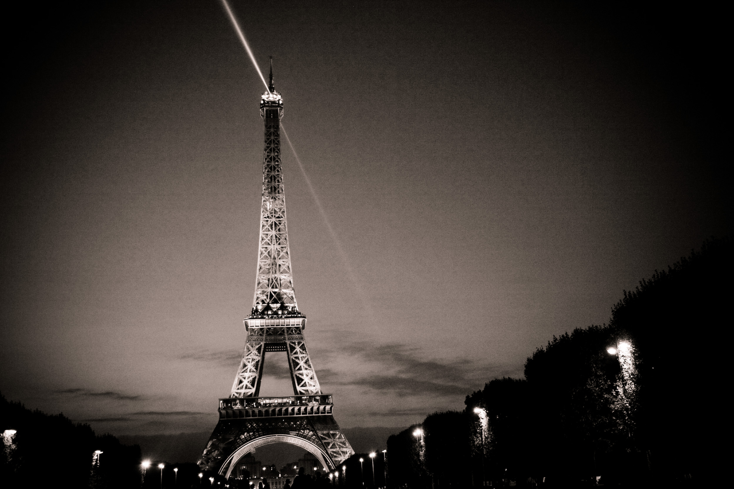 A duotone conversion of anotherwise vibrantly colorful Eiffel Tower at dusk.  Mell and I had a picnic on the Champ de Mars and watched night fall over the Eiffel.